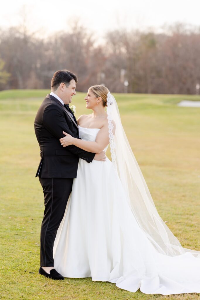Bride and groom portraits on golf course, Red Barn at Westchester Country Club