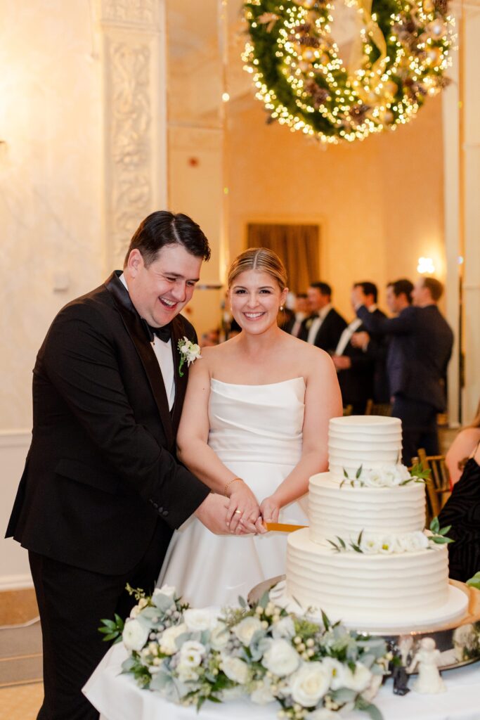 cutting the cake, wedding cake inspiration, bride and groom cake cutting