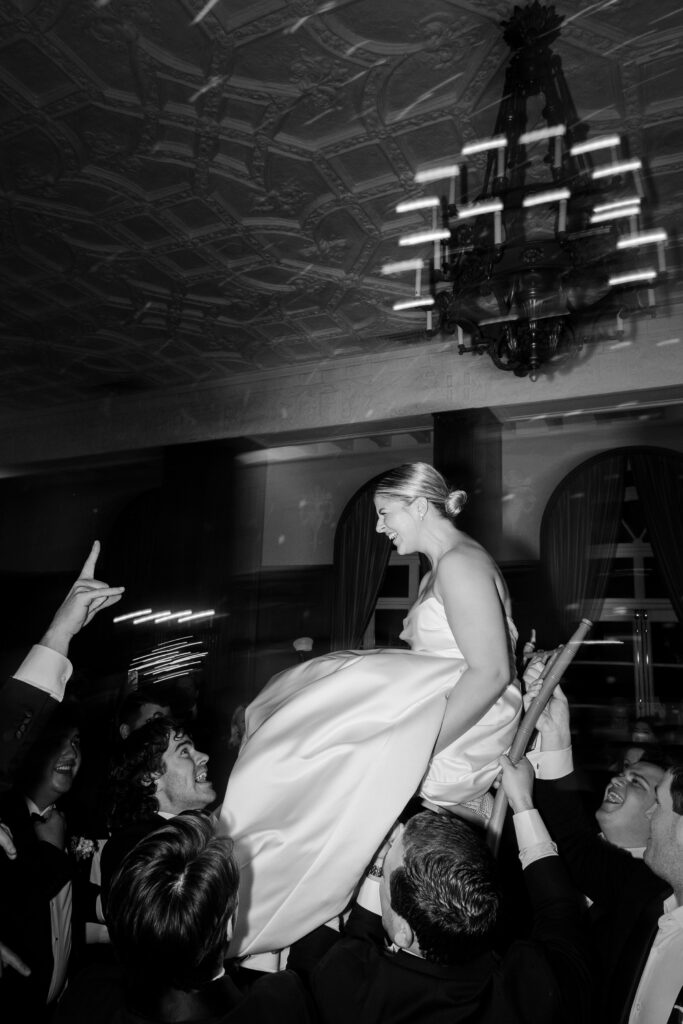 Bride carried in chair at reception, Westchester Country Club wedding reception, WCC wedding reception