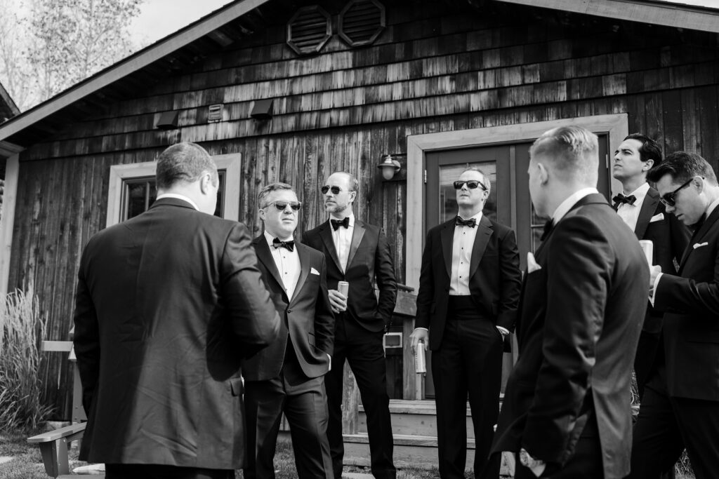 groom and groomsman getting ready in Jackson Hole, 