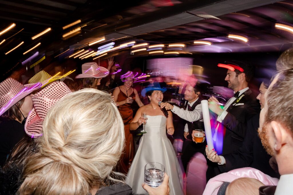 Bride singing karaoke, wedding reception in Jackson Hole 