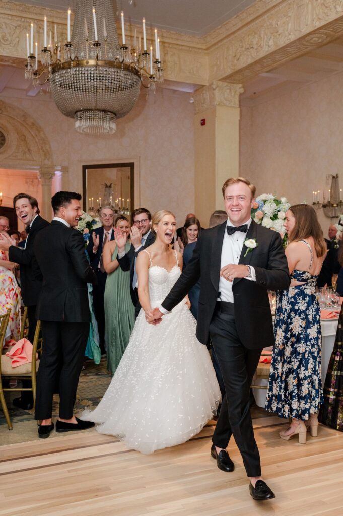 bride and groom grand entrance to reception