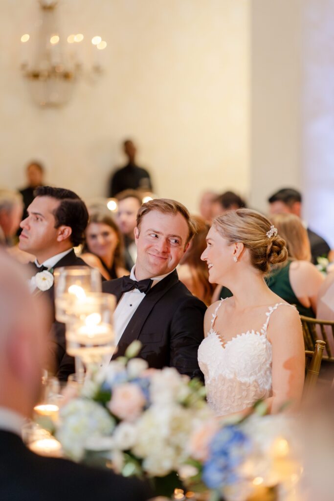 Wedding at Westchester Country Club, Westchester country club wedding, bride and groom smiling during speaches