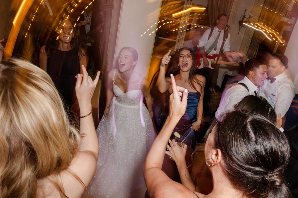 Wedding at Westchester Country Club, bride dancing at reception