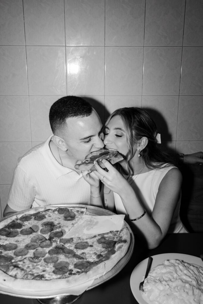 New York Pizzeria engagement, bride and groom eating pizza