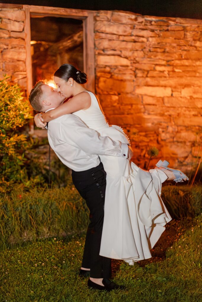 posing can look natural, bride and groom kissing