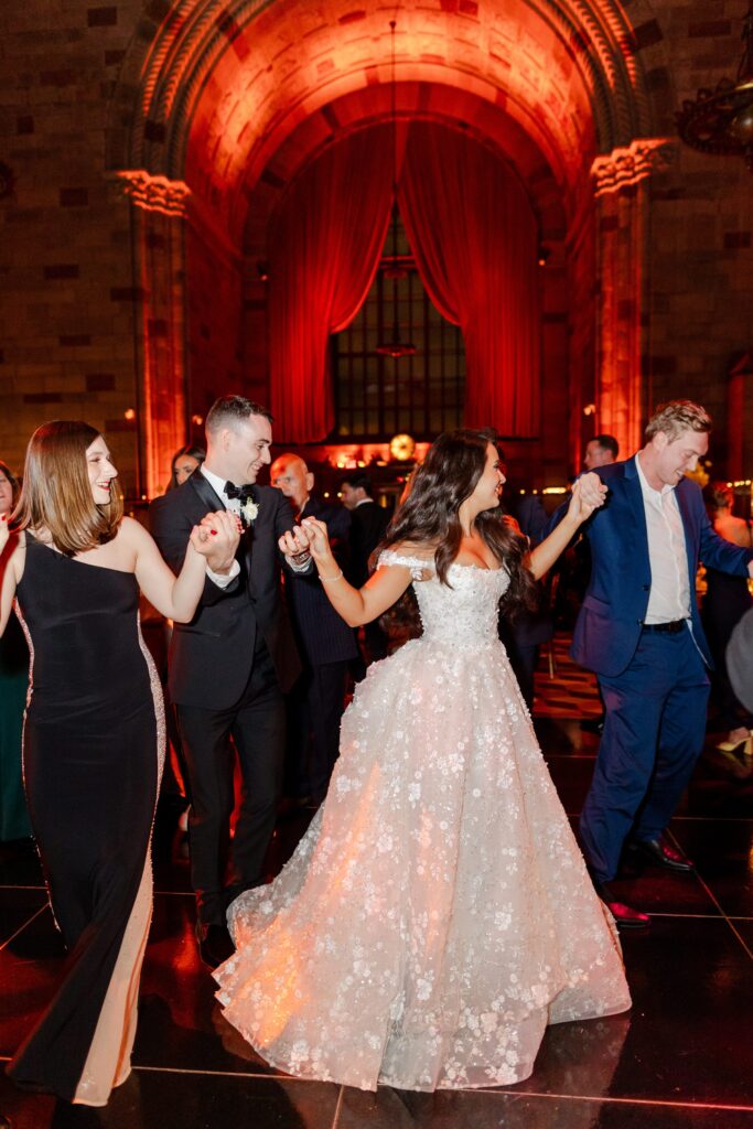 bride and groom dancing with guests Cipriani 42nd Street Wedding, Croatian wedding dances