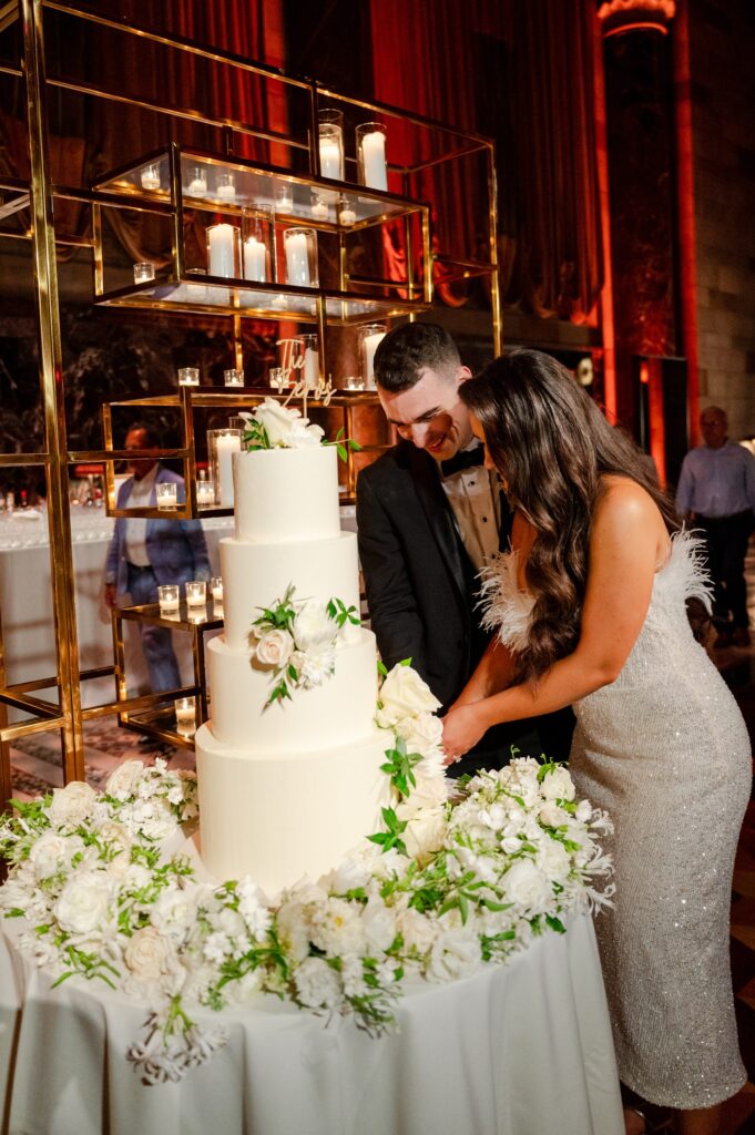 bride and groom cutting cake, Cipriani 42nd Street Wedding, New York City Wedding