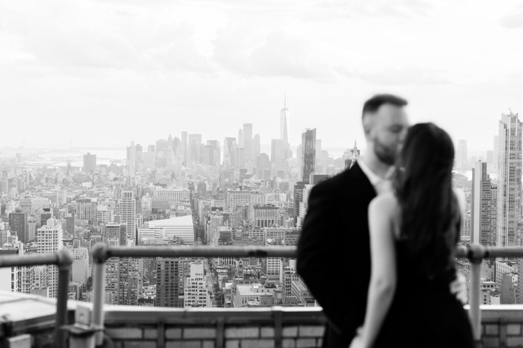 engagement session in New York, couple kissing on balcony of the Chrysler Building in NYC, New York City engagement session, Chrysler building 