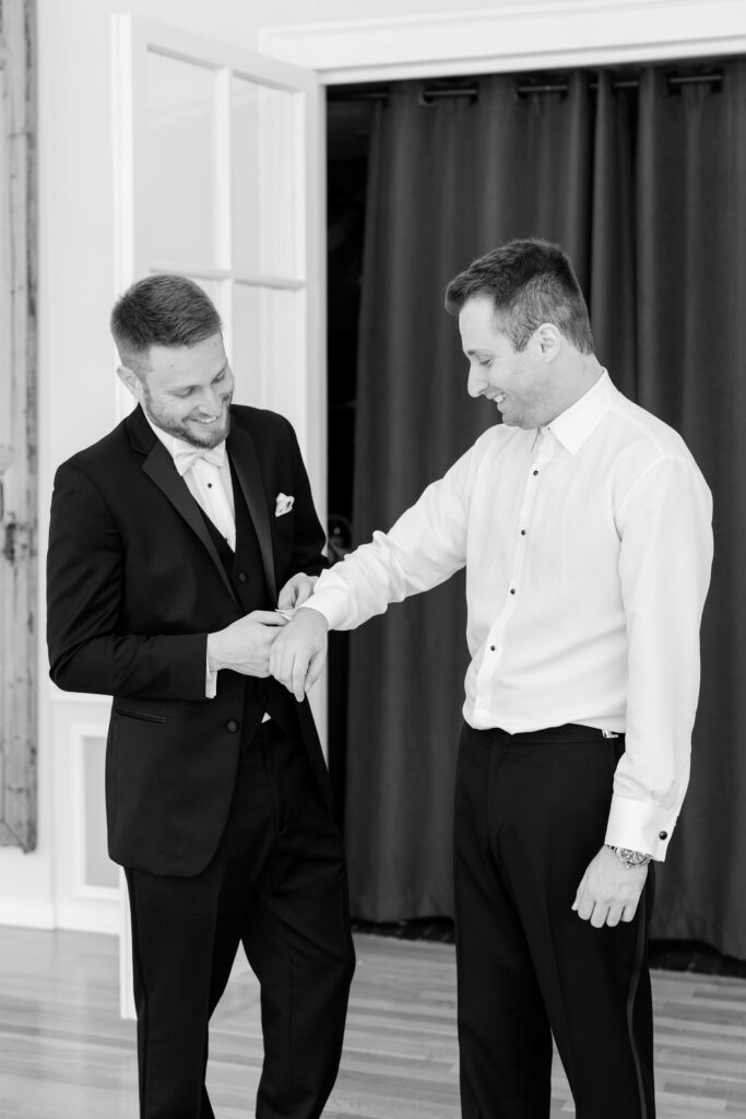 groom getting ready with groomsmen