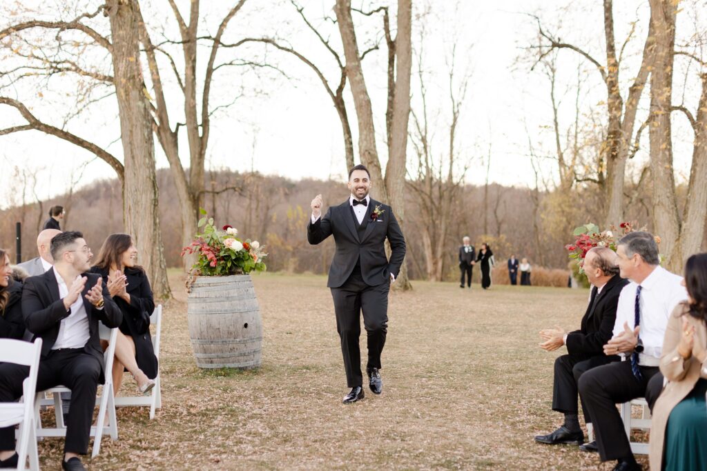 groom walking down the aisle, Outdoor ceremony at Red Maple Vineyard, New York Vineyards venue inspiration, Red Maple Vineyard ceremony 