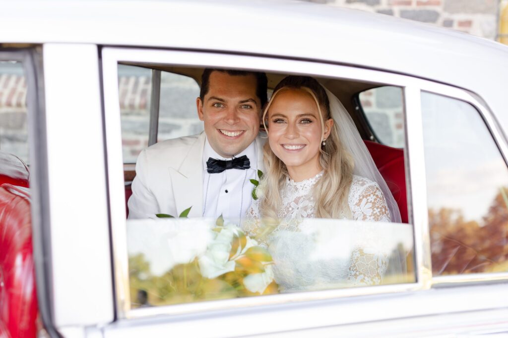 bride and groom portraits, bride and groom in Rolls ROycce, Winged Foot Golf Club Wedding, New York golf cub wedding 