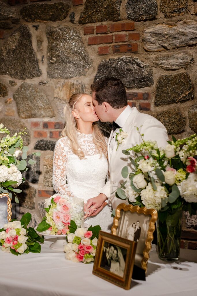 bride and groom cutting cake at Winged Foot Golf Club