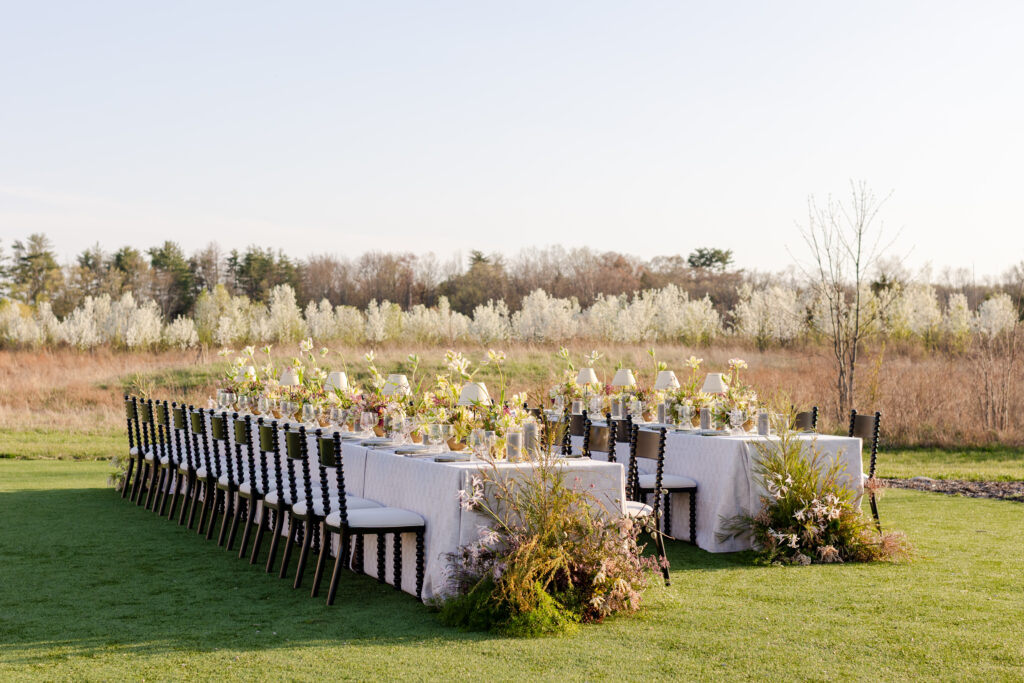 tablescape in for outdoor reception at Wildflower Farms Auberge Resort Collection